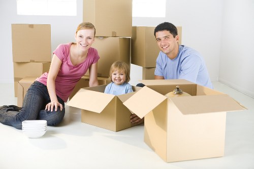 Professional movers loading furniture for an Epsom relocation