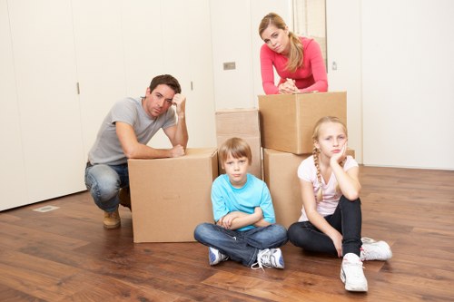 Boxes and furniture being loaded for removals in Epsom