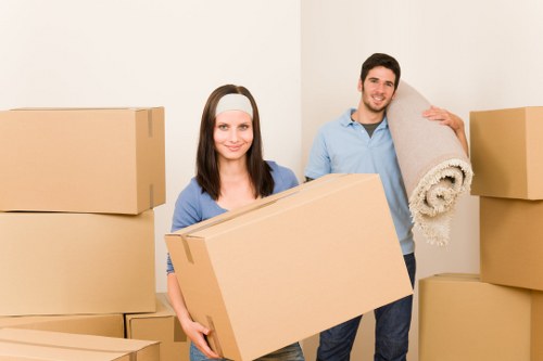 Commercial removals van loading office equipment in Epsom