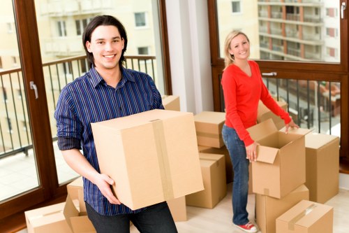 Moving crew unloading boxes at a local Epsom property